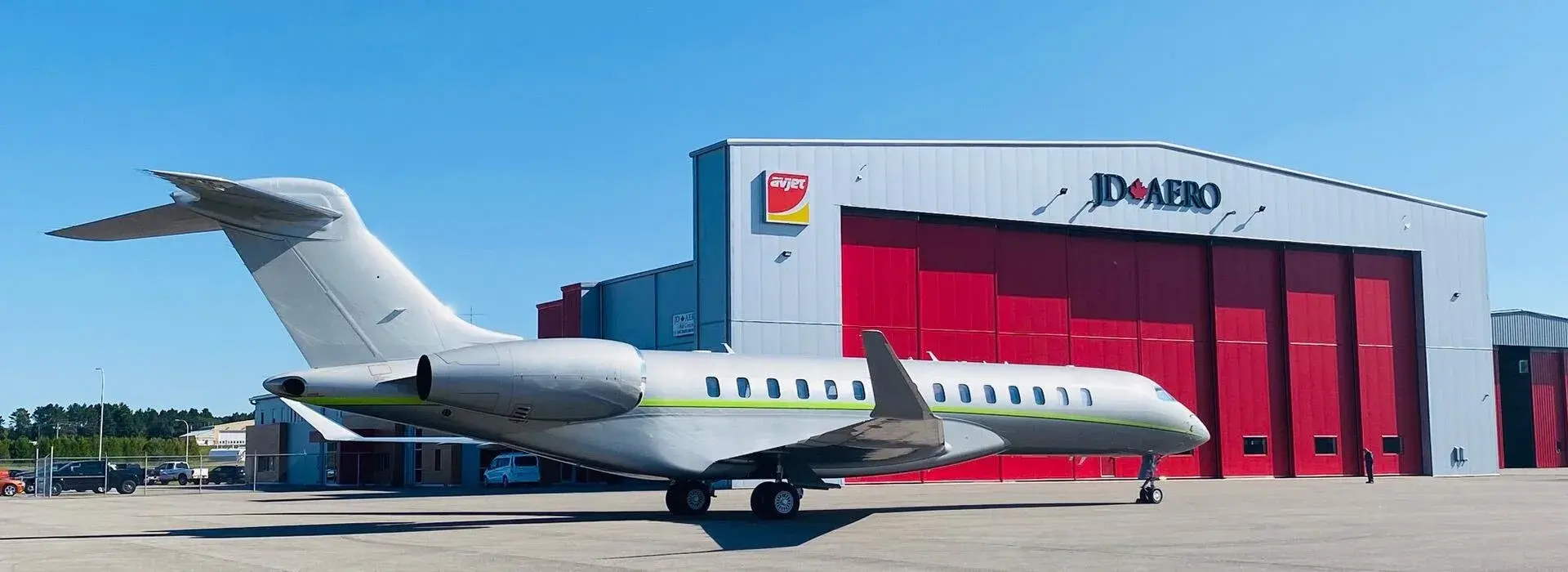 JD Aero hanger with plane in front of it